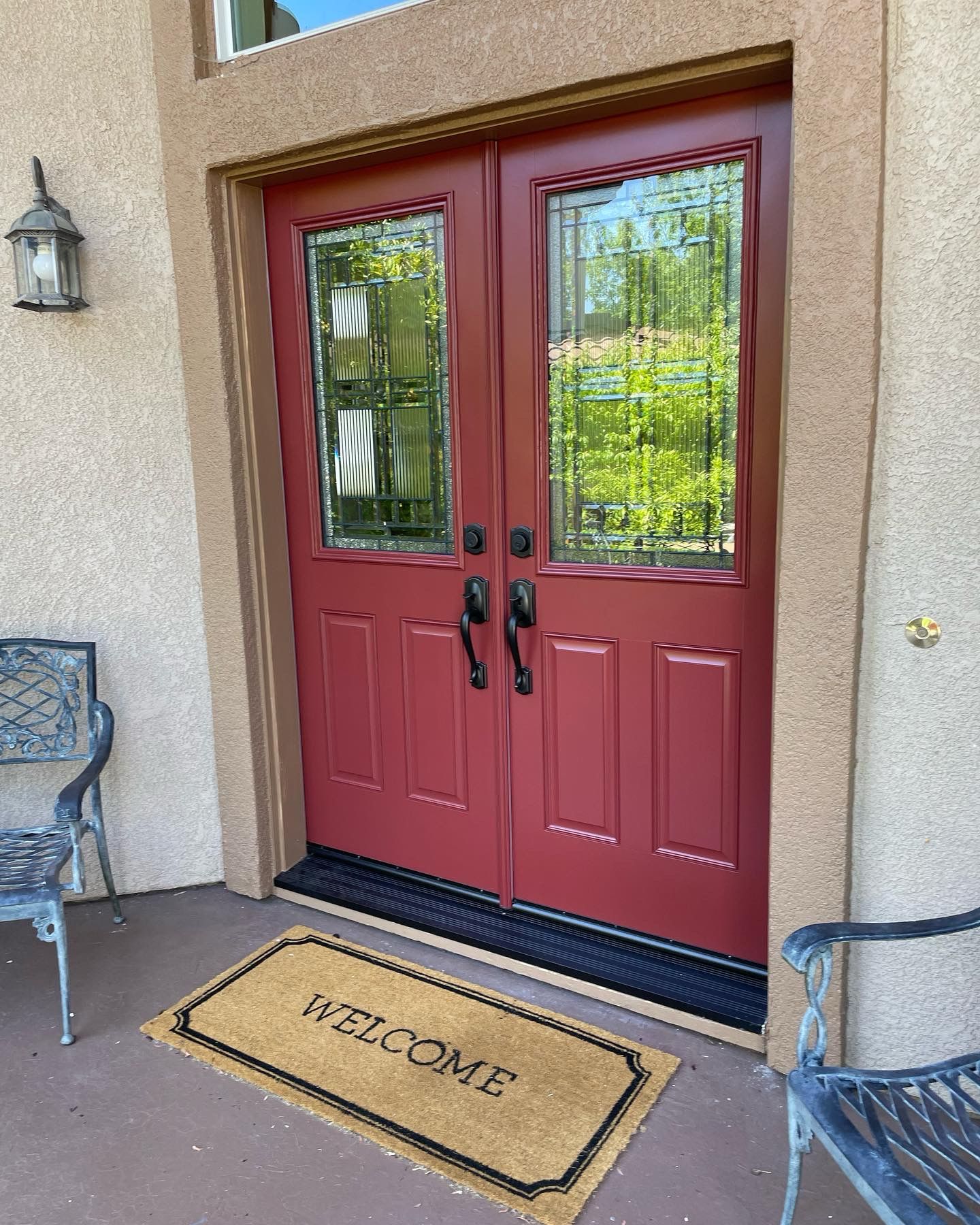 Red Front Door with Glass Panels and Welcome Mat