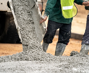 Workers Pouring Concrete for Foundation Construction Fairfield CA