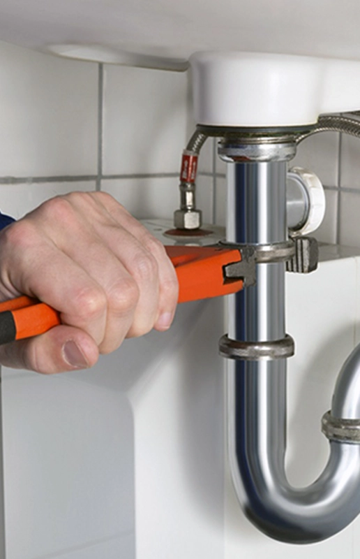 Plumber Using Wrench on Sink Pipe for Home Remodeling Fairfield CA