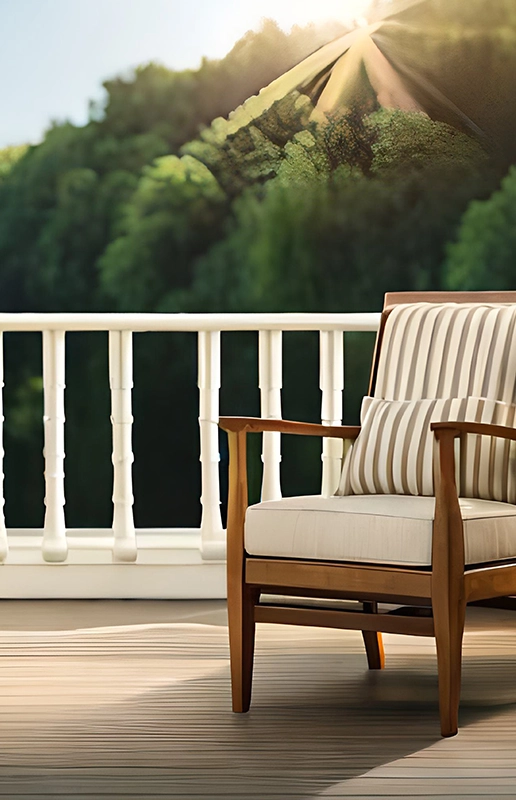 Wooden Deck with Cushioned Chair Overlooking Green Forested Area