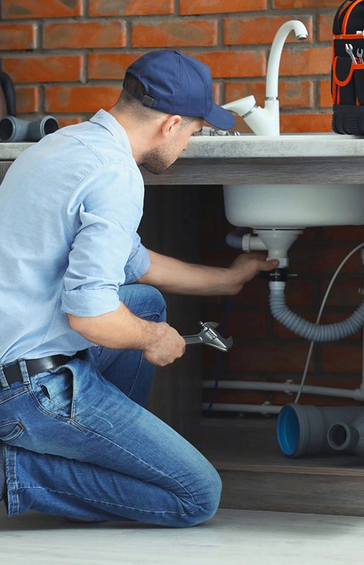 Plumber Fixing Sink Piping in Kitchen Remodeling Fairfield CA