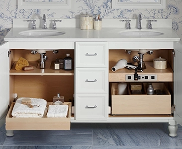 Organized White Bathroom Vanity with Open Cabinets and Twin Sinks